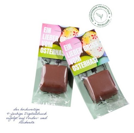 Pistazien-Nougatpraline mit Displaykarte mit Logo