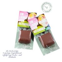 Pistazien-Nougatpraline mit Displaykarte mit Logo